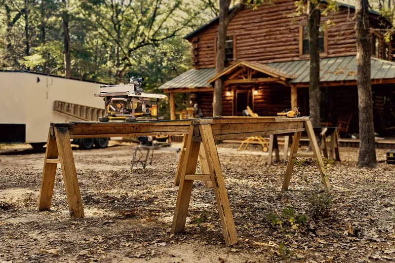 DEWALT table saw outdoors on wood sawhorses, SKUs DWS780, DWS780-QS, DWS780-LX, DWS780KIT, DWS780-XE.